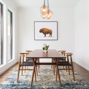 a floor rug makes a dining area cozy in winter