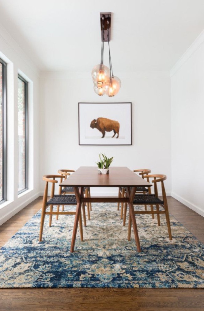 a floor rug makes a dining area cozy in winter