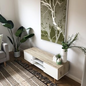 Styled living space with green artwork - Melbourne Home Staging - Leeder Interiors