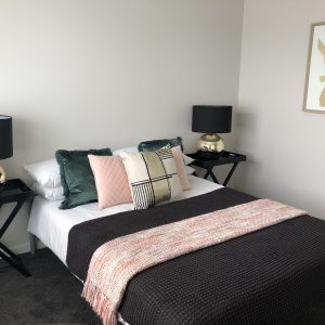 bedroom with green and pink accents - Home Staging Melbourne - Leeder Interiors