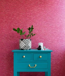 Colour of the moment...Teal A teal table against a pink wall.
