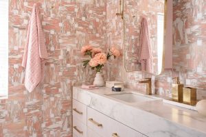 A bathroom scene tastefully decorated in pink and white tones, inspiration for a barbiecore interior.