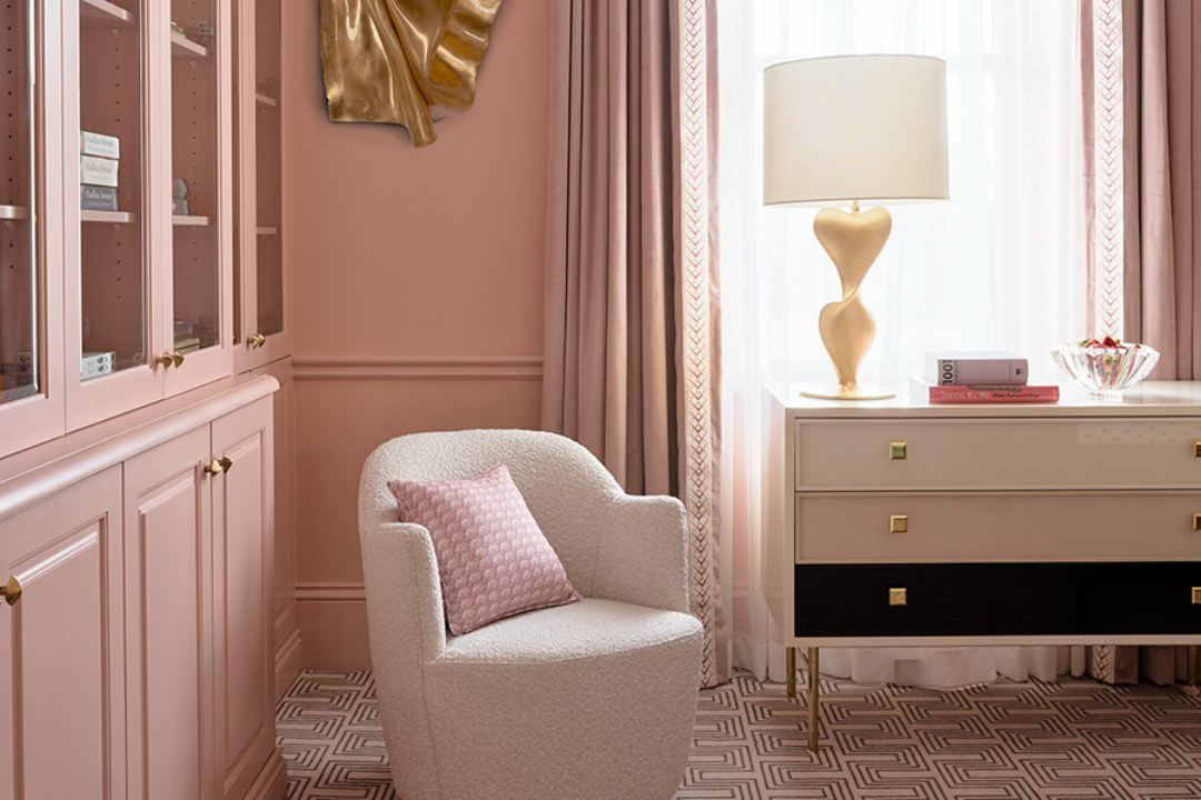 A bedroom scene tastefully decorated in pastel pink shades, inspiration for a barbiecore interior.
