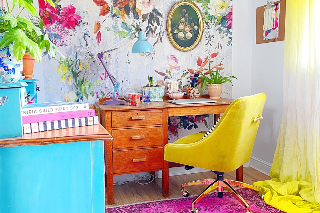 A wide shot of a colorfully decorated home office, inspiration for a barbiecore interior.