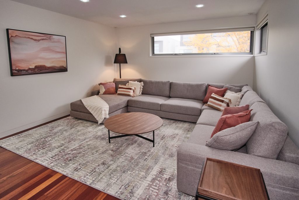 A stylish media room in a modern family home