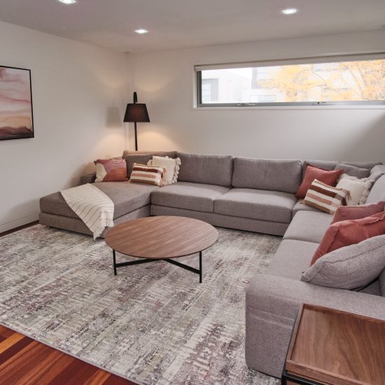 A stylish media room in a modern family home